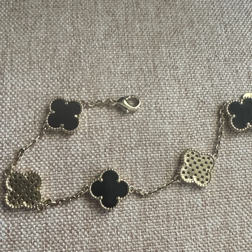 Gold-Tone Clover Link Bracelet‎ with Black and Mother-of-Pearl Accents